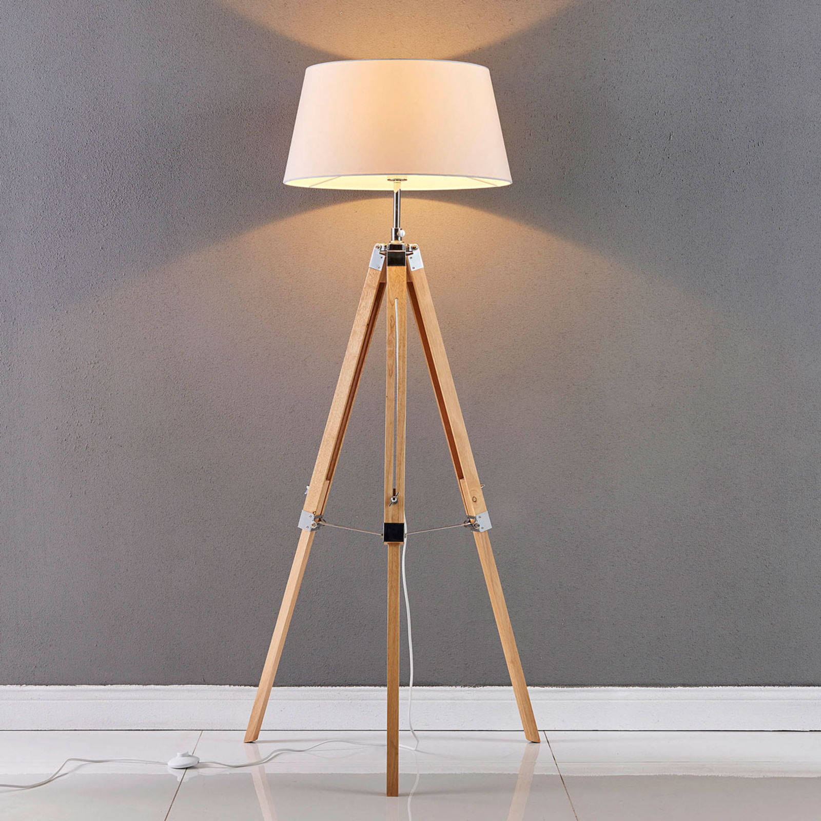 Katie floor lamp with a threelegged wooden stand Lights.ie