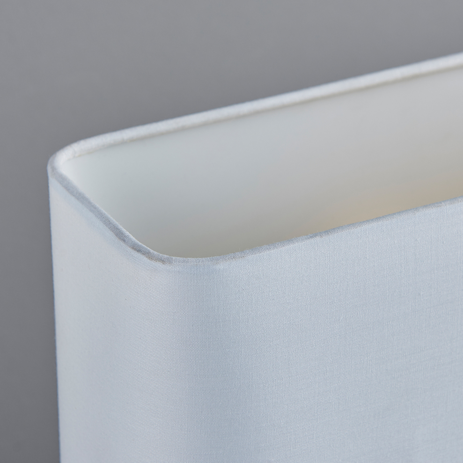 Angular, white fabric table lamp Nisa Lights.co.uk