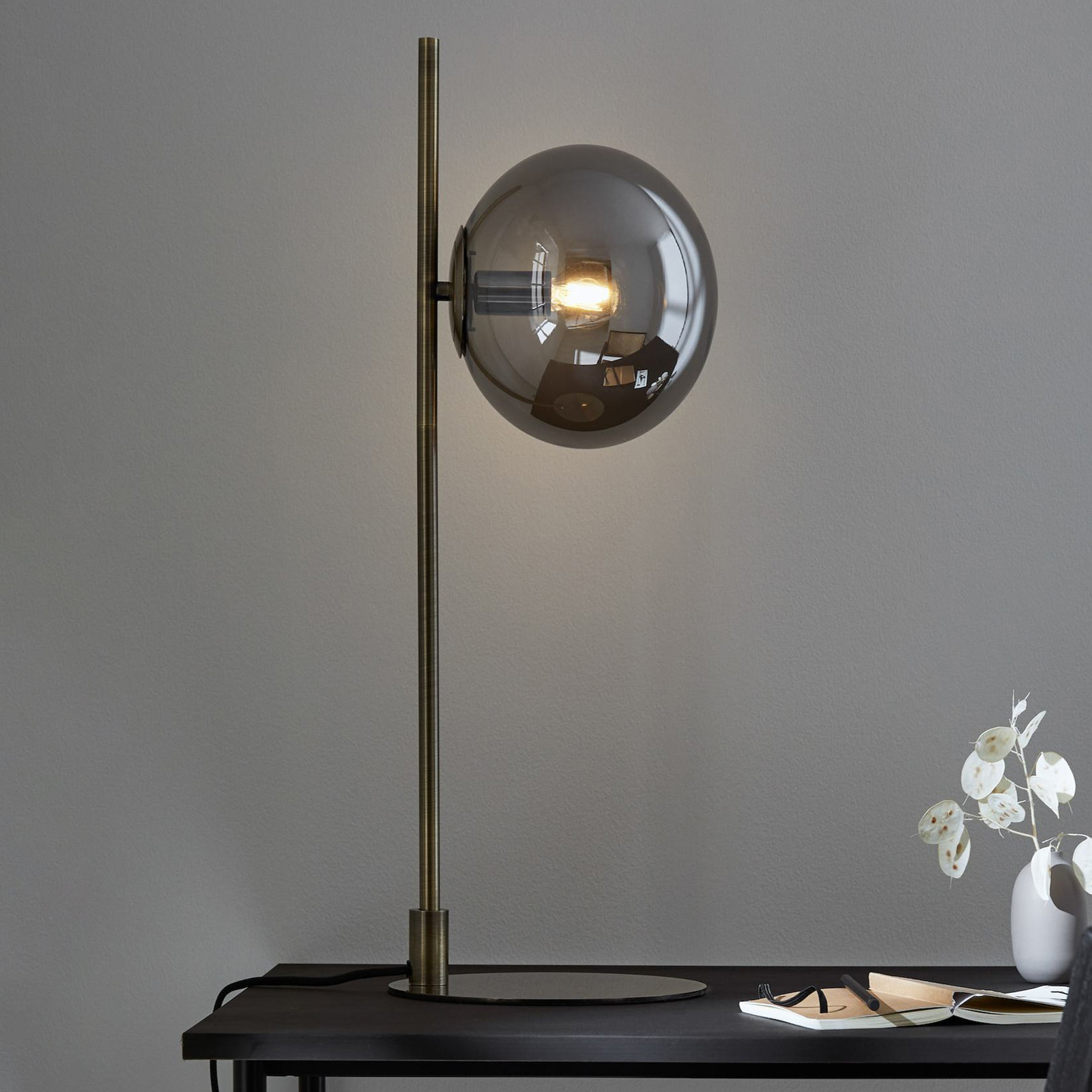 Dione table lamp, brass/smoke grey, glass, iron