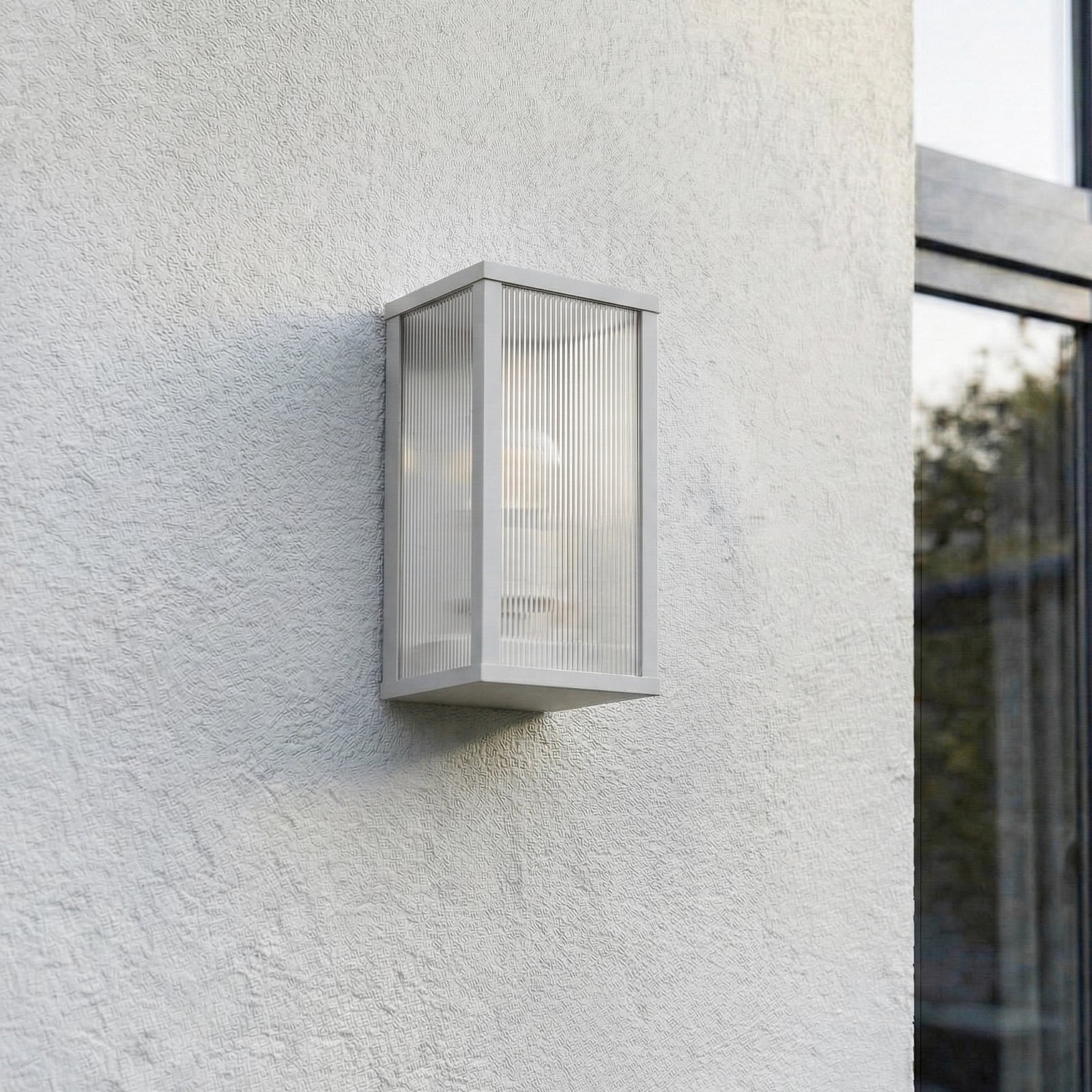 Venkovní nástěnné svítidlo Peldar, 26 cm, šedá/rýhovaná, IP44 – Lindby