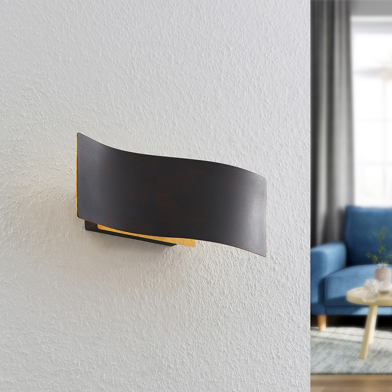 Lindby Larisa LED wall light, undulating shape Lights.co.uk