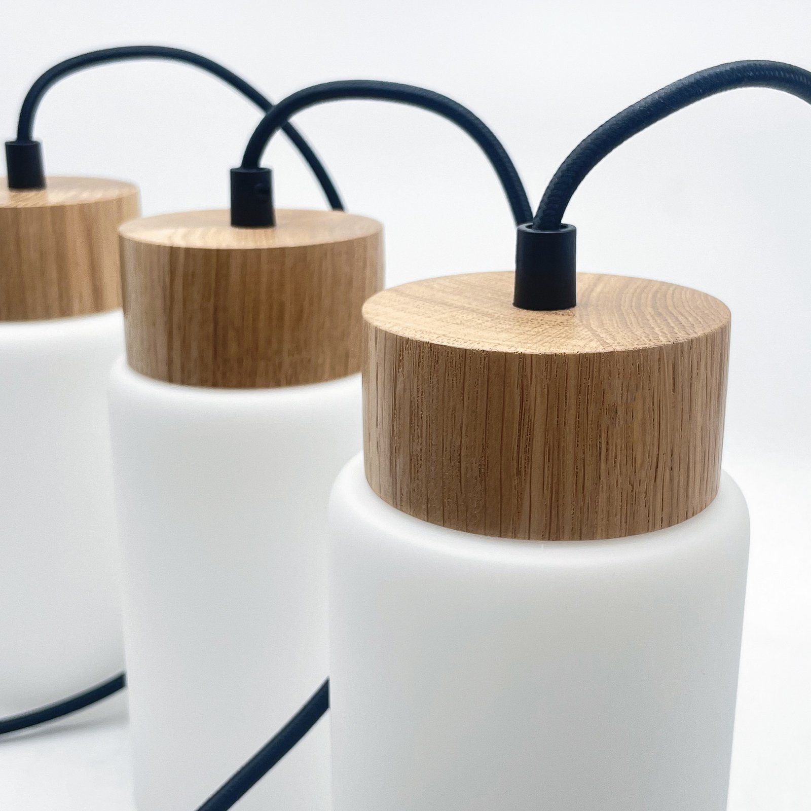 Markus pendant light, opal glass/oak, length 80 cm, 4-bulb.