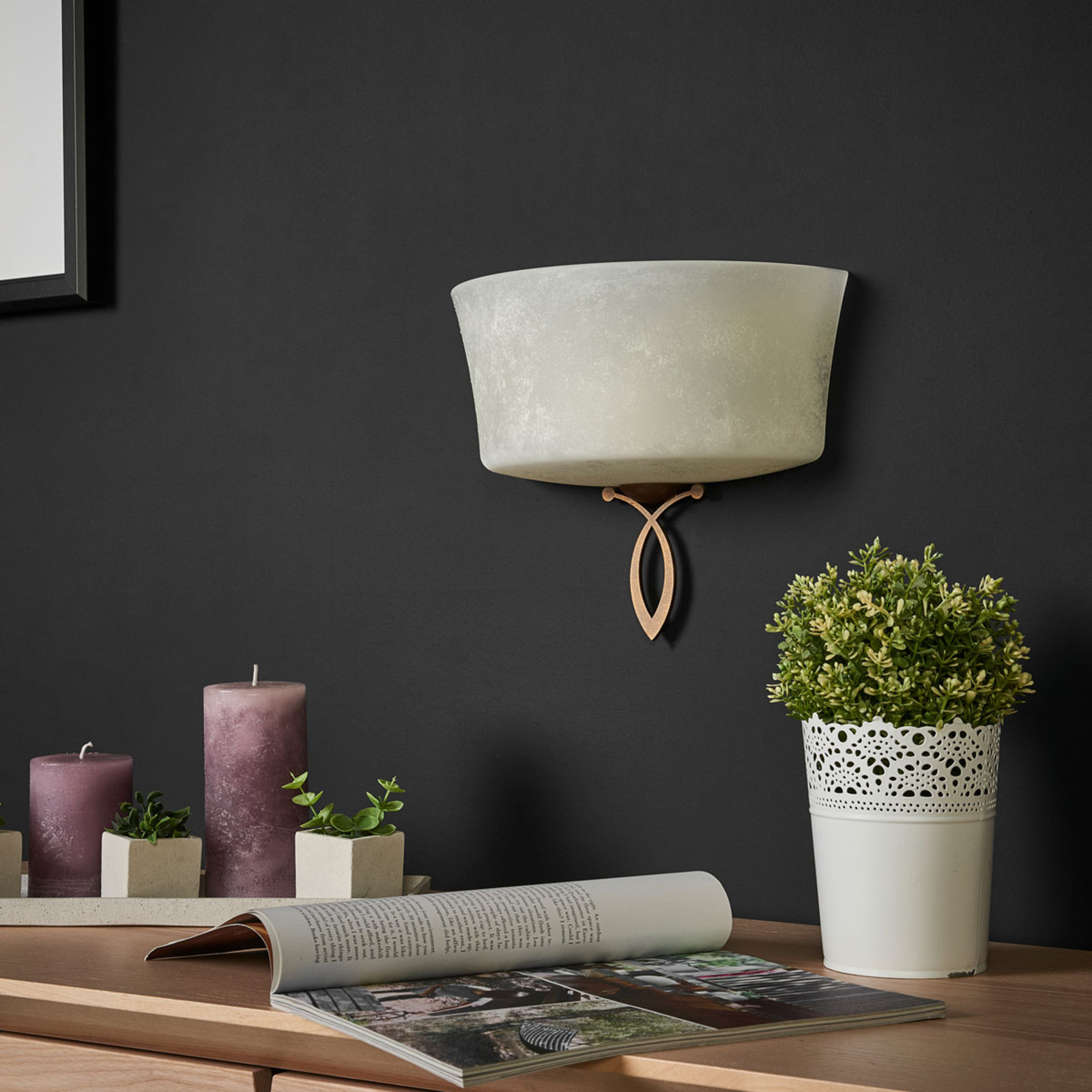 Alessio wall light in an uplighter design