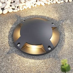 Lindby gulv-spotlight med LED Cormac, 4 lyskilder, Ø 21 cm, IP67