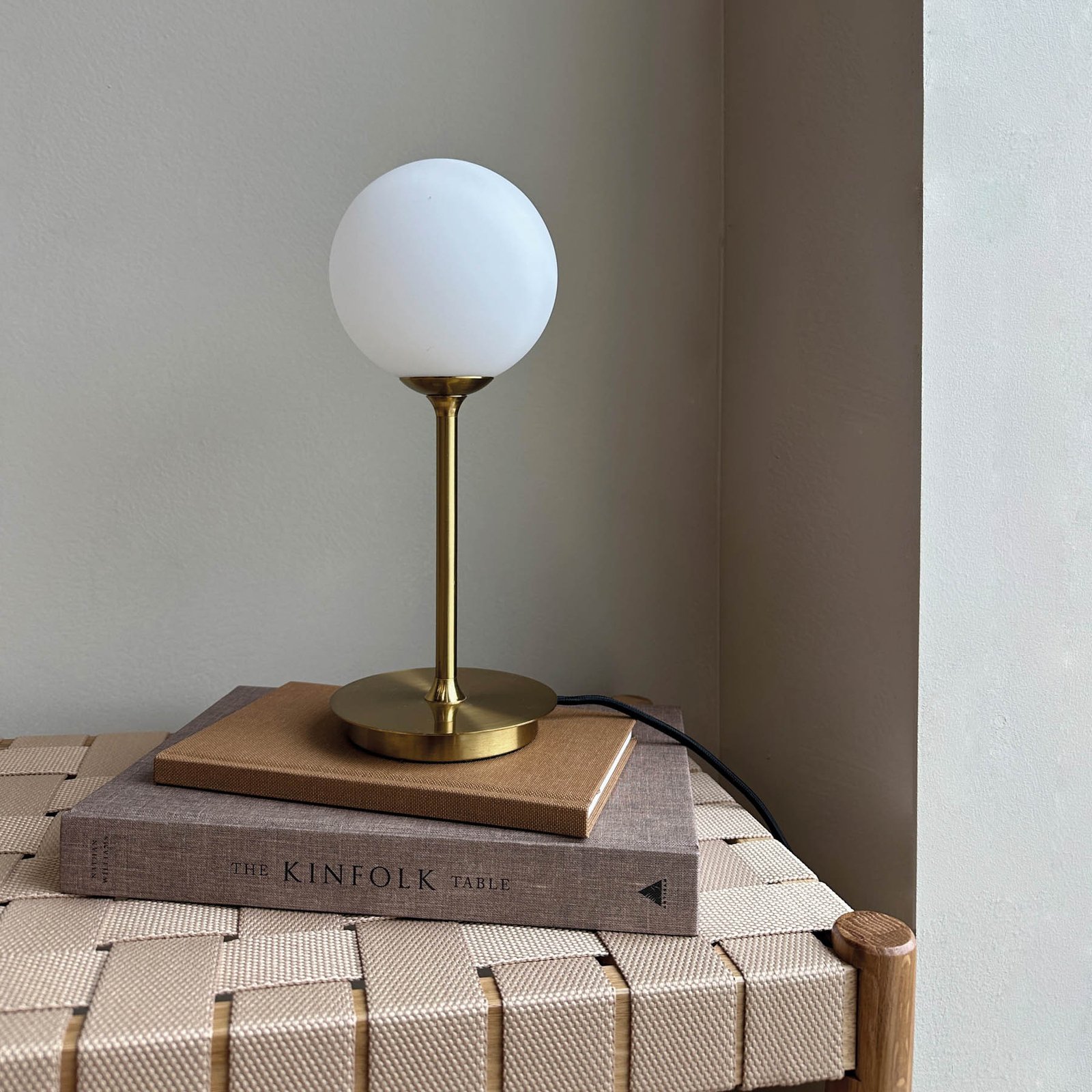 Dyberg Larsen table lamp Sia, opal/brass-coloured, height 12 cm