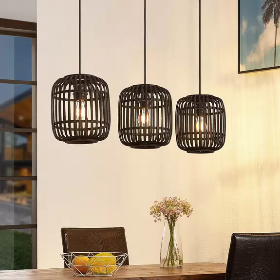 Lampenwelt Lindby Pendellampe Canyana, schwarz, 3-flg., Rattan, 105 cm