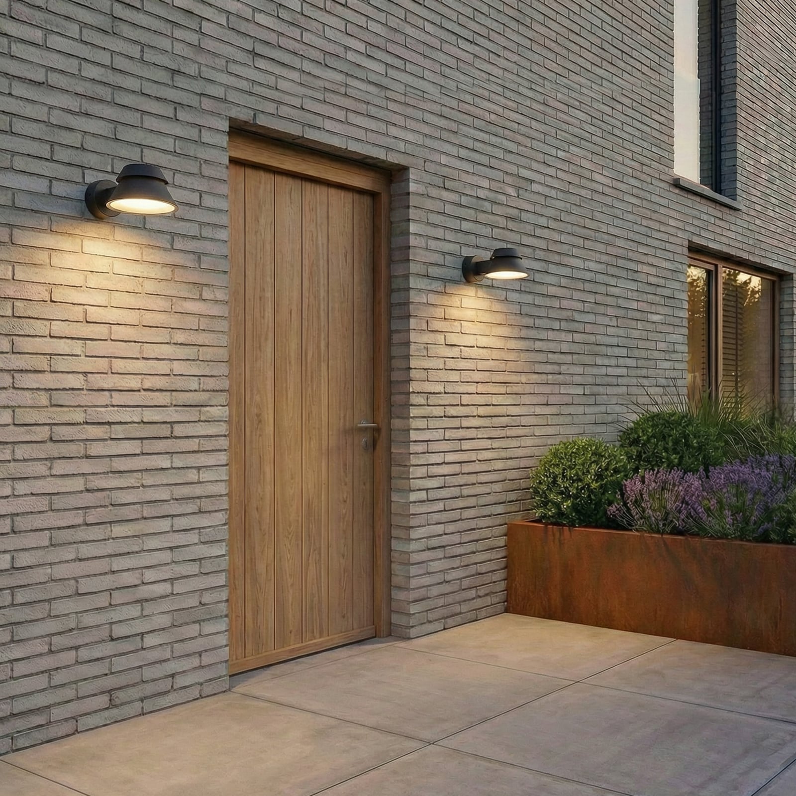 Moena LED-utomhusvägglampa, IP44, aluminium, glas, svart – Lucande