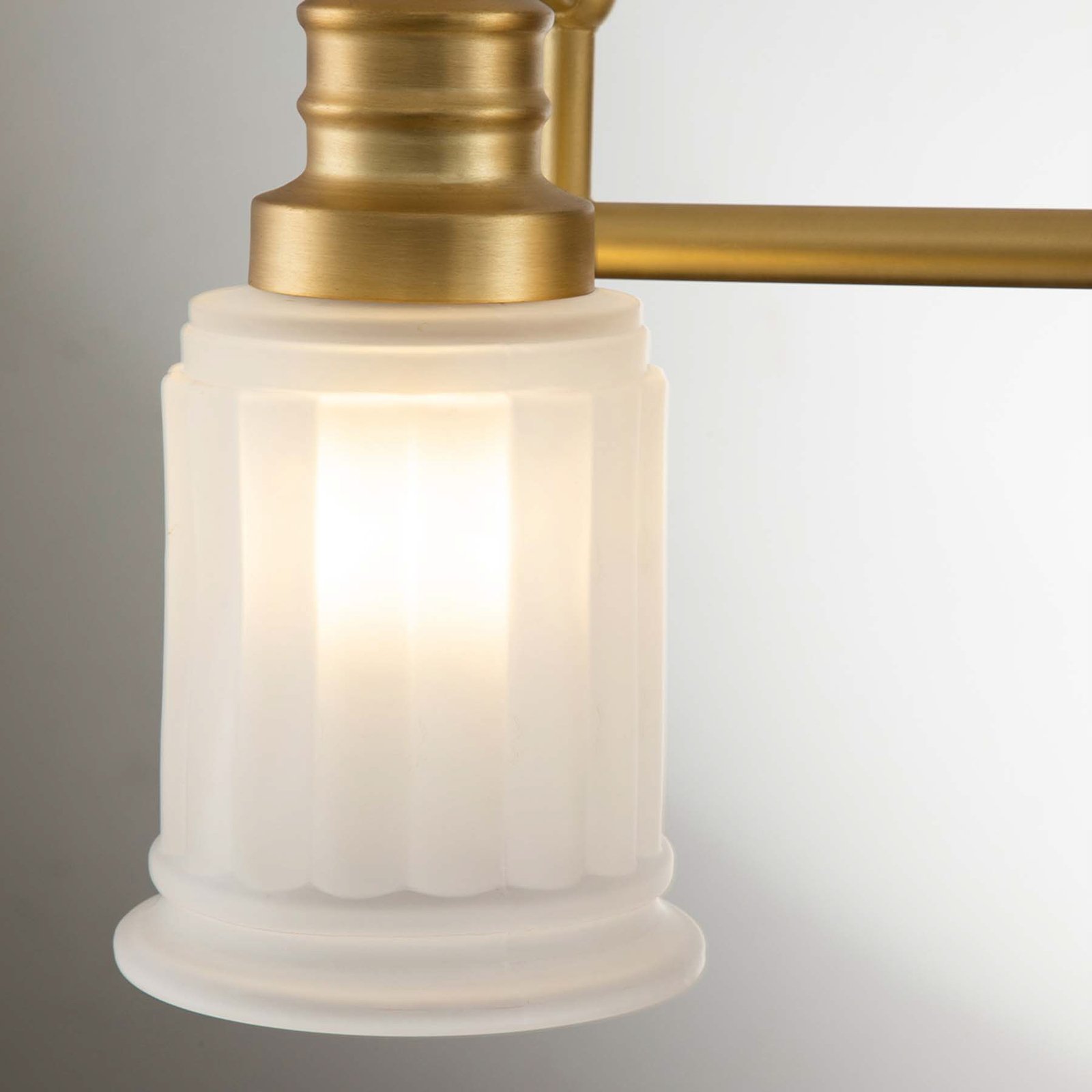 Wall light Swell IP44, 3-bulb, brushed brass