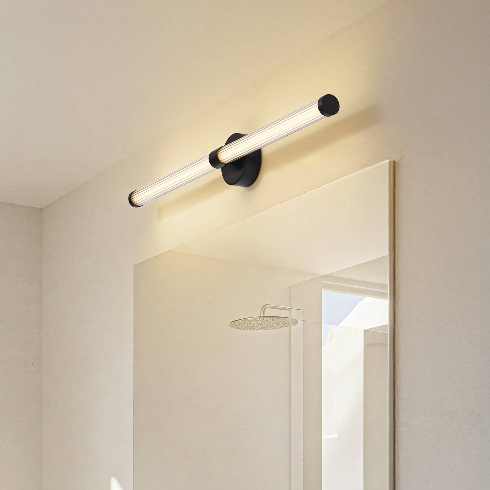 Lucande LED-Wandleuchte Melisa, schwarz, 90 cm, CCT, IP44 günstig online kaufen