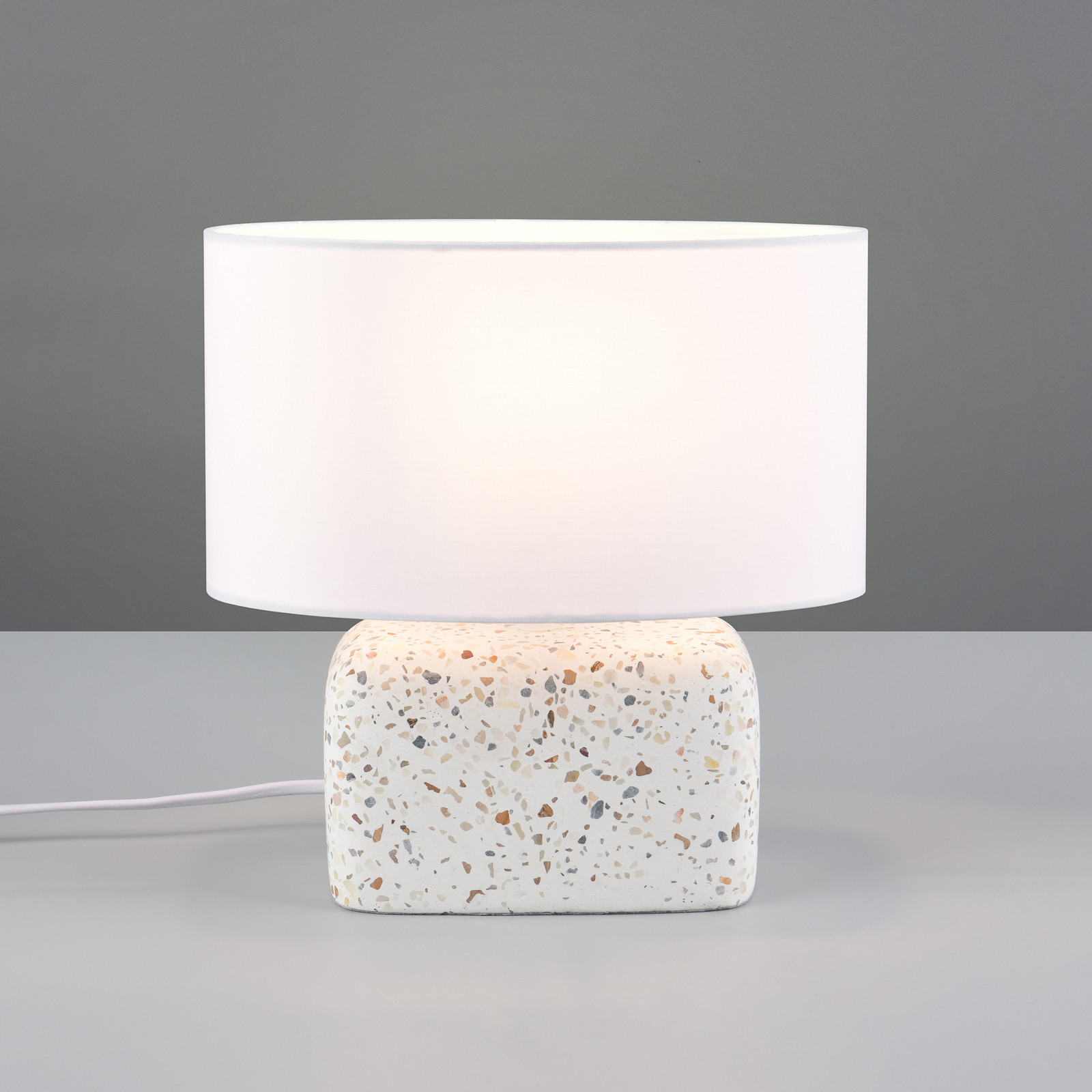 Trio Lighting Настолна лампа „Ливаре“, височина 24 см, бяла/цветна, бетон/плат