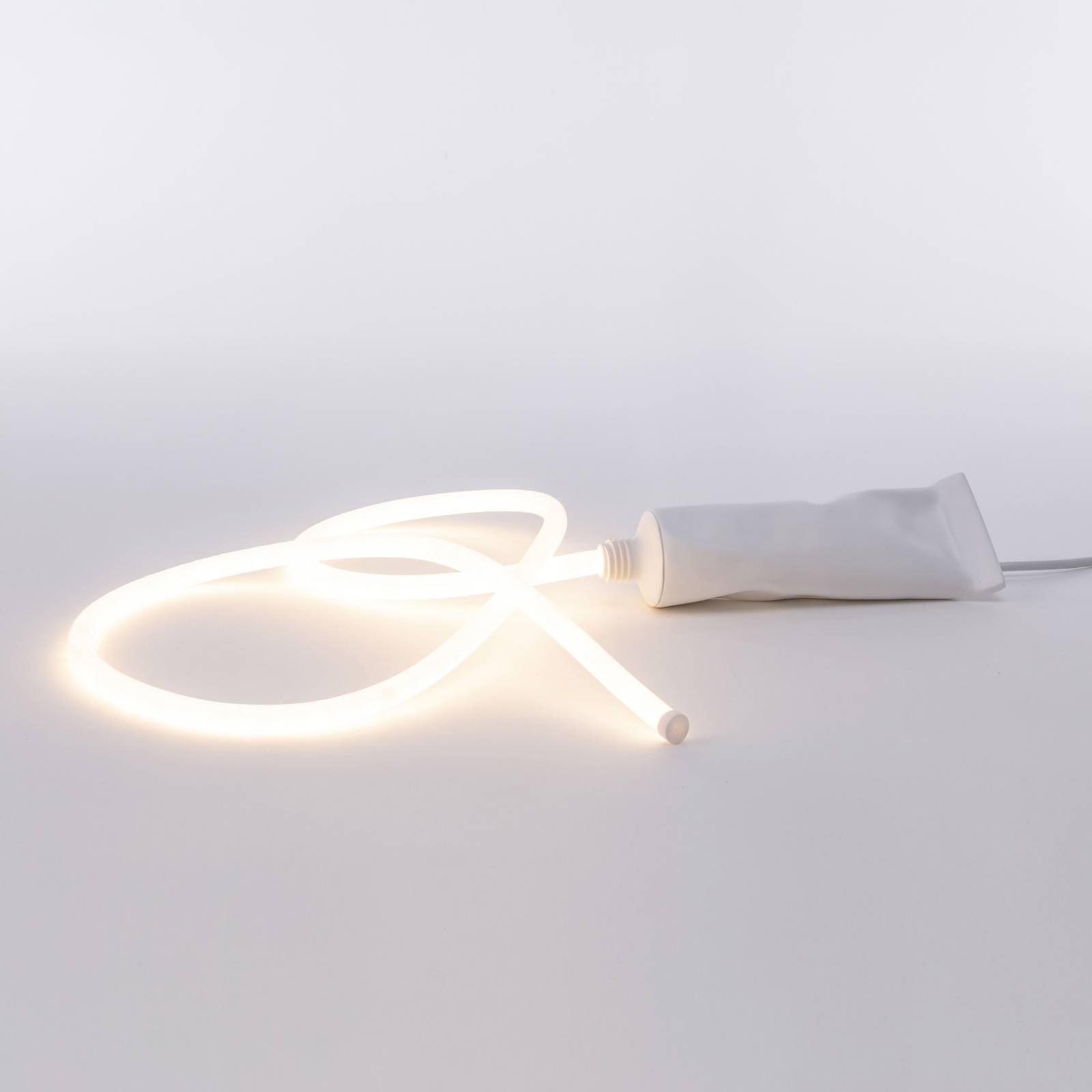 Image of SELETTI Lampe table déco LED Daily Glow tube de dentifrice 8008215153544
