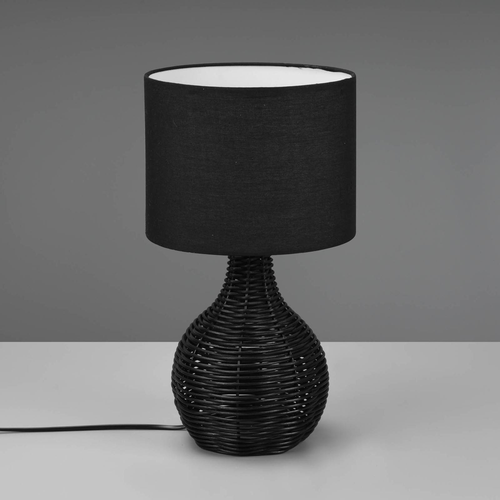 Reality Leuchten Sprout table lamp, rattan and fabric, black