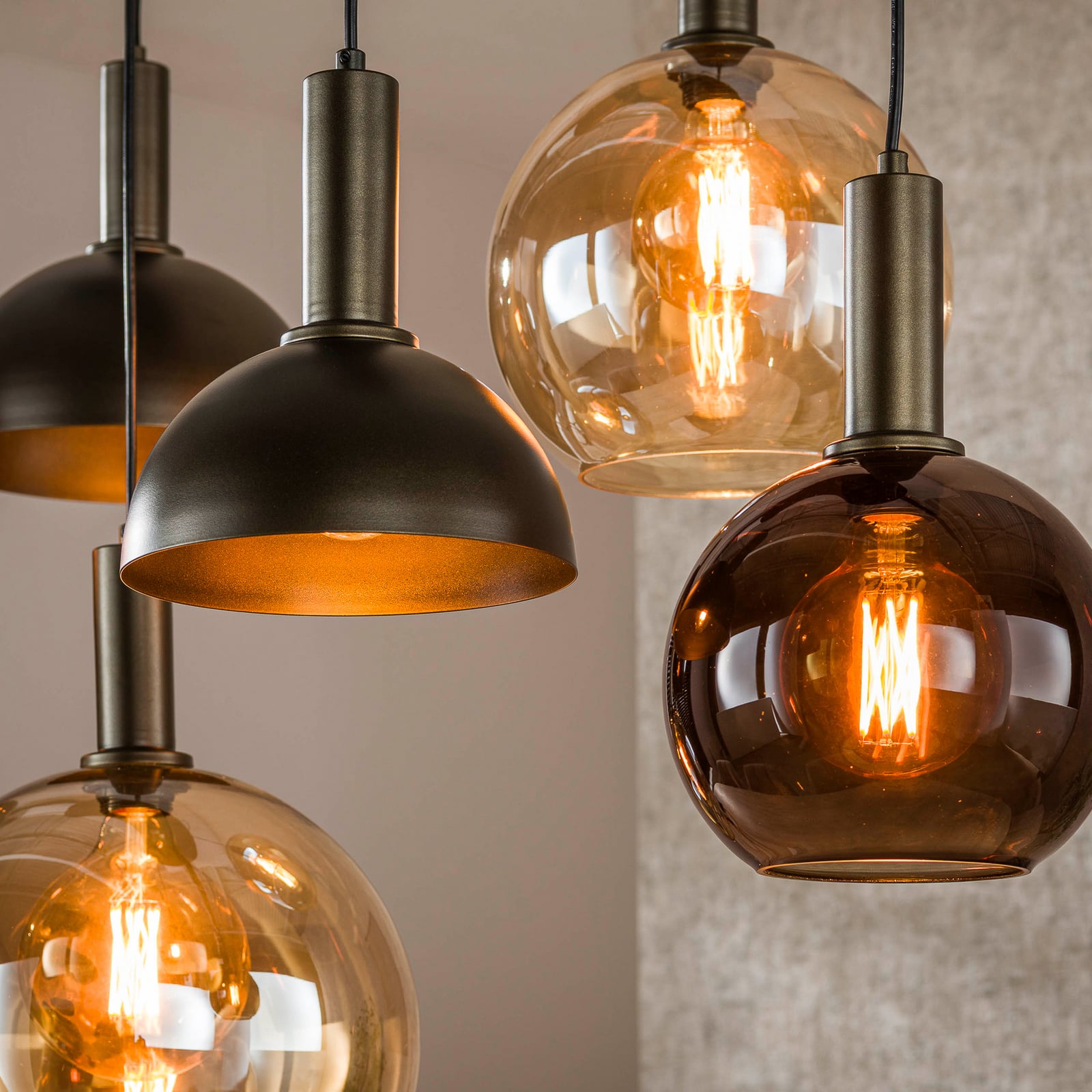 Pendelleuchte Cluster, amber/grau, Glas/Metall, 7-flg., E27 Pendelleuchte Cluster, amber/grau, Glas/Metall, 7-flg., E27