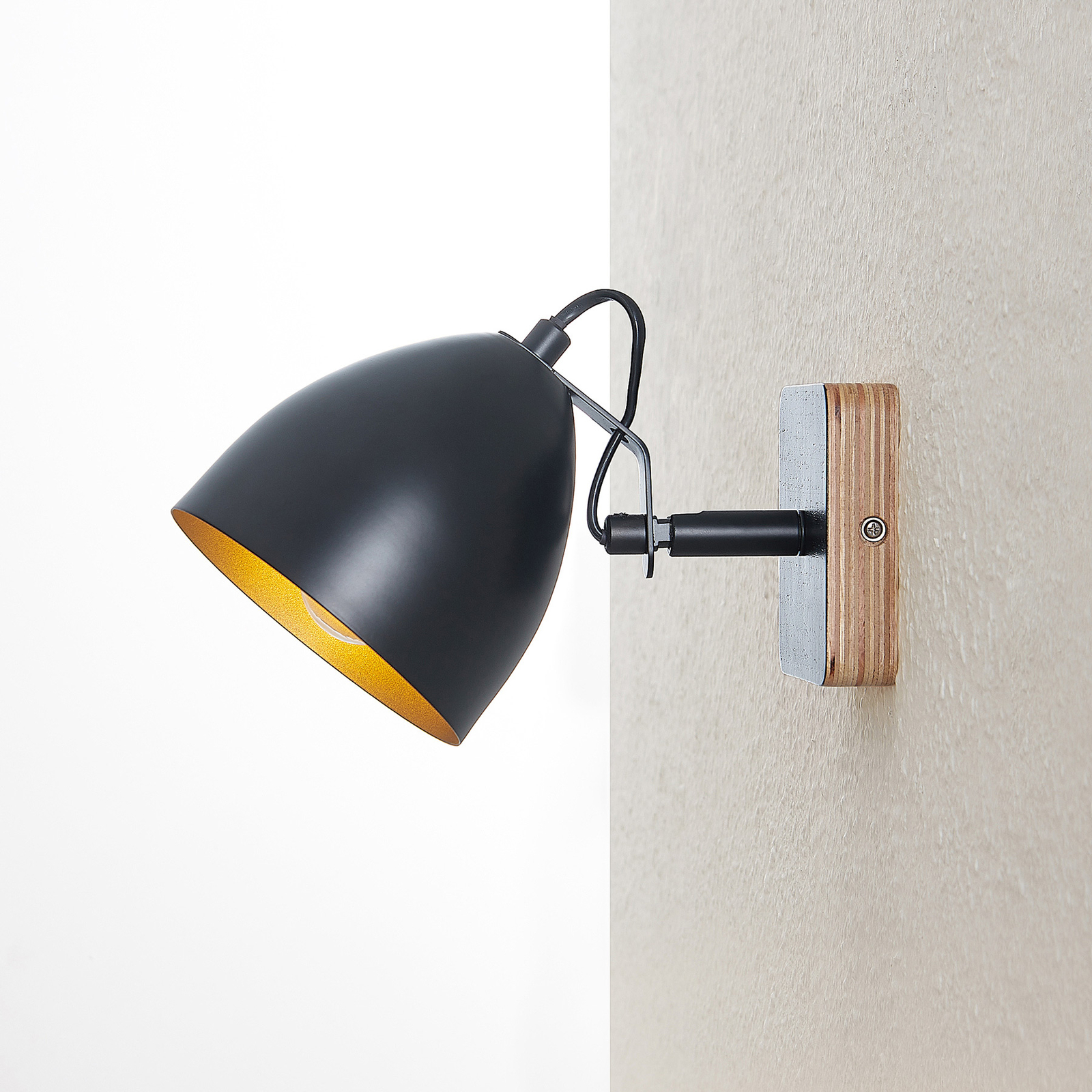 Lindby Colton wall spotlight black/gold, 1-bulb