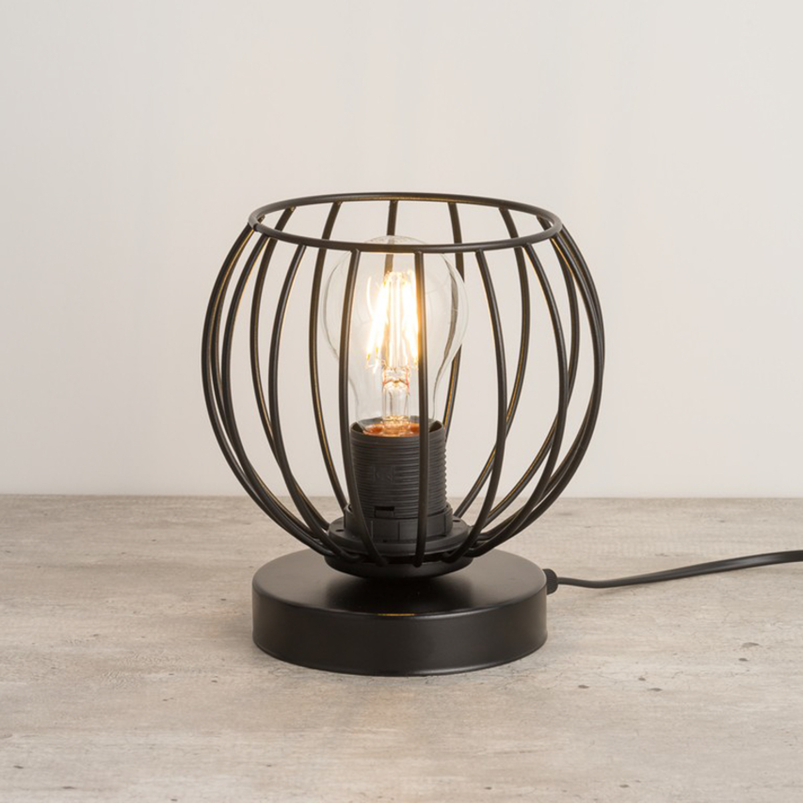 Bordslampa Nele, svart, utformad som en bur