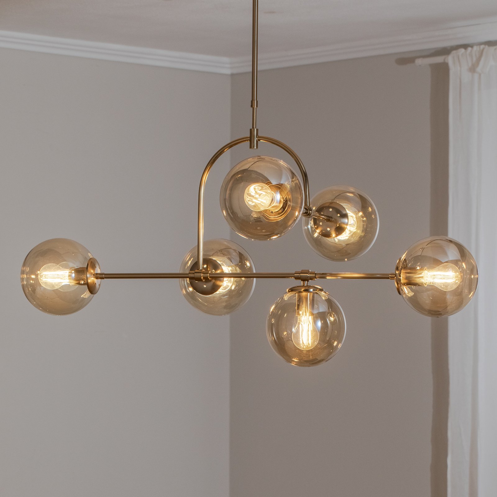 Portemo pendant light, brass, length 104 cm, 6-bulb, glass