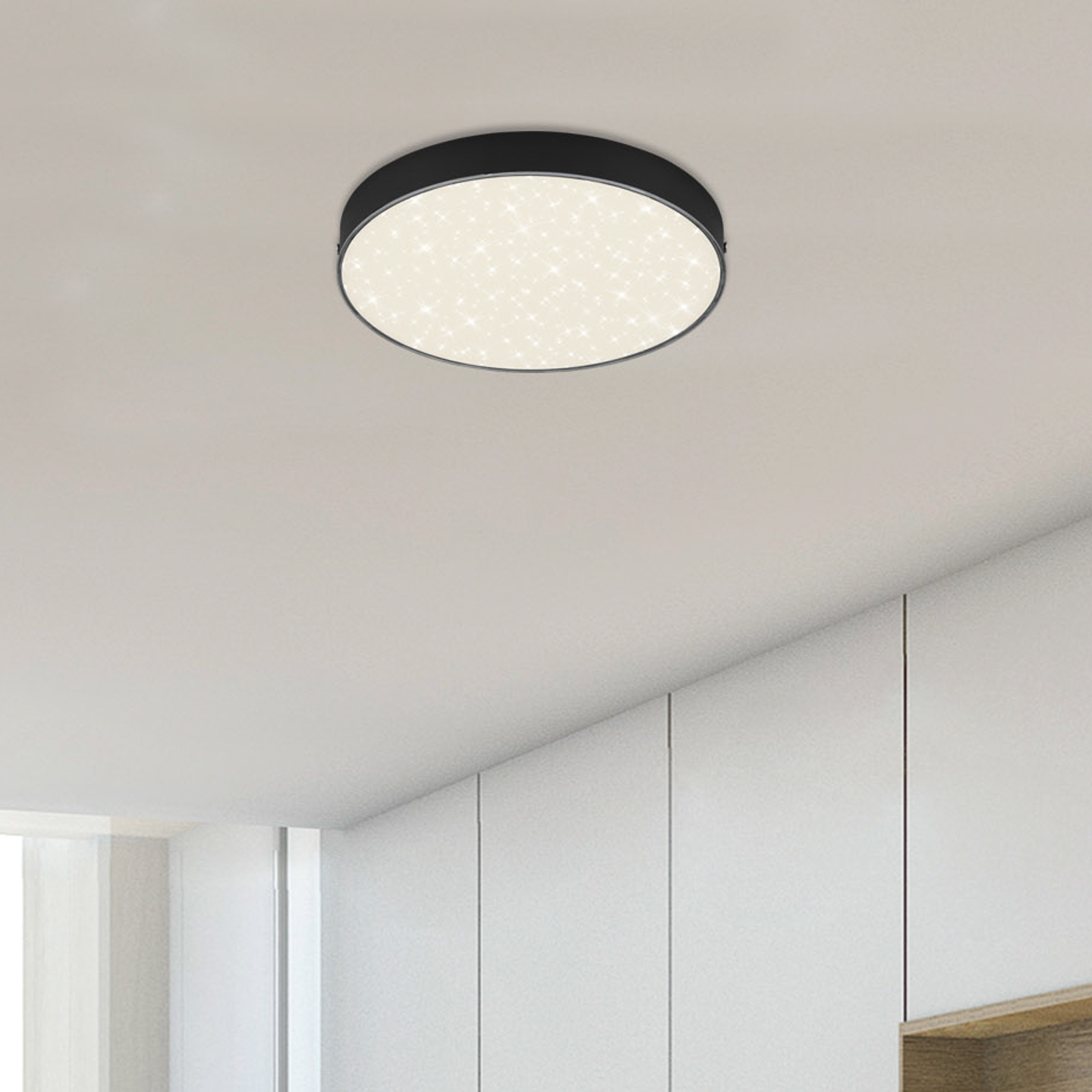 Flame Star LED ceiling light, Ø 21.2 cm, black