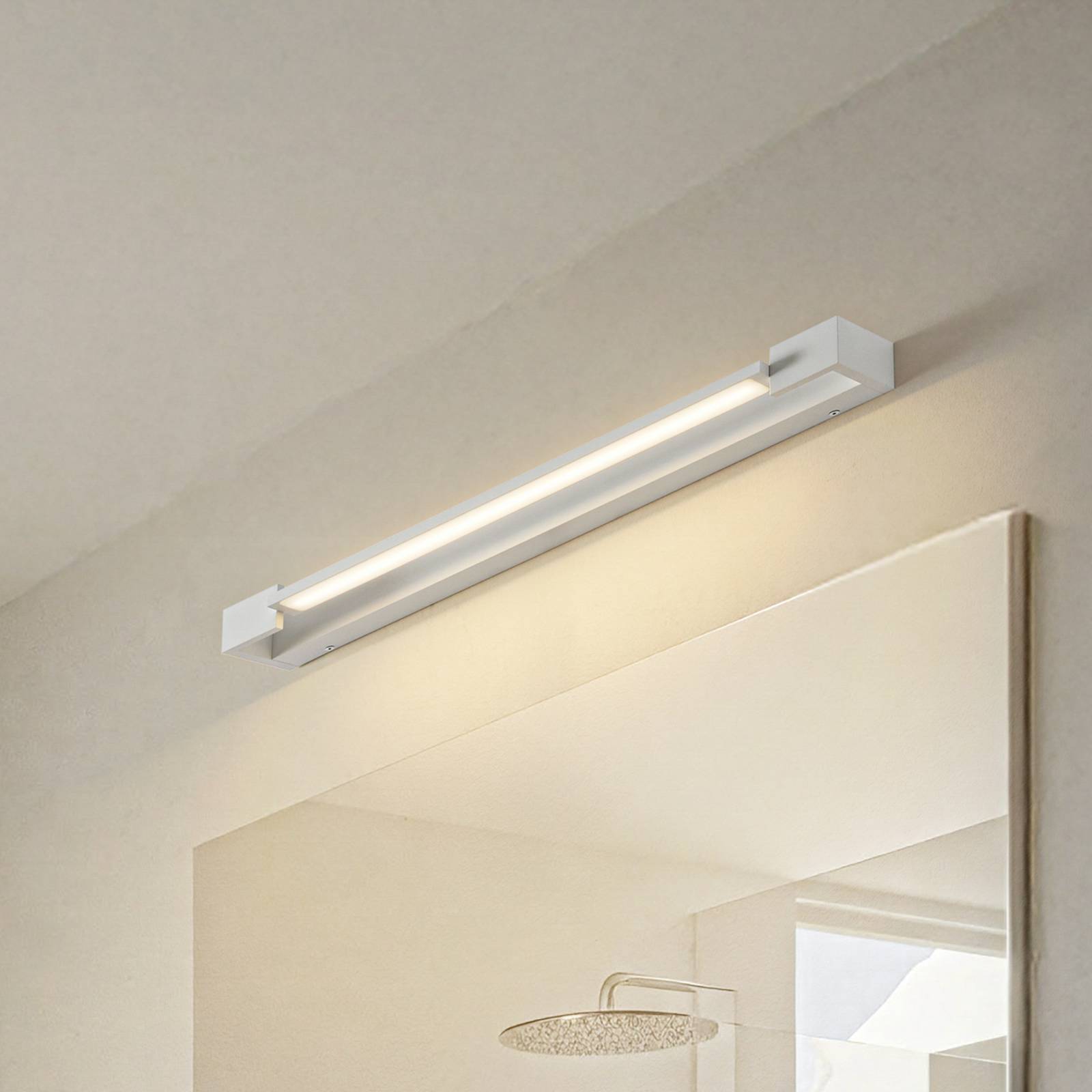 Arcchio LED-Wandleuchte Jora, 60 cm, weiß, schwenkbar, IP44 günstig online kaufen