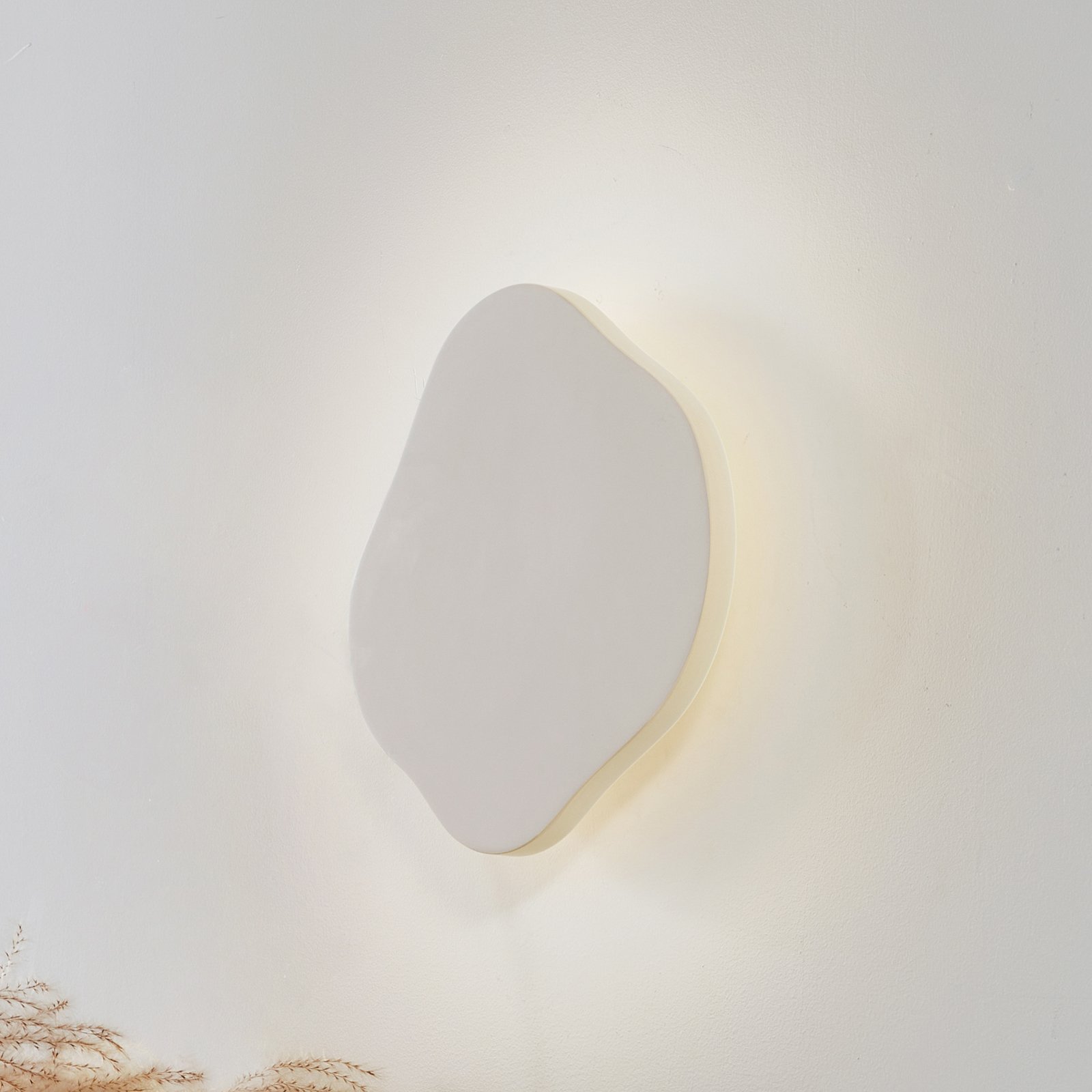 Lindby LED wall light Nielson, beige, plaster, 30 cm high