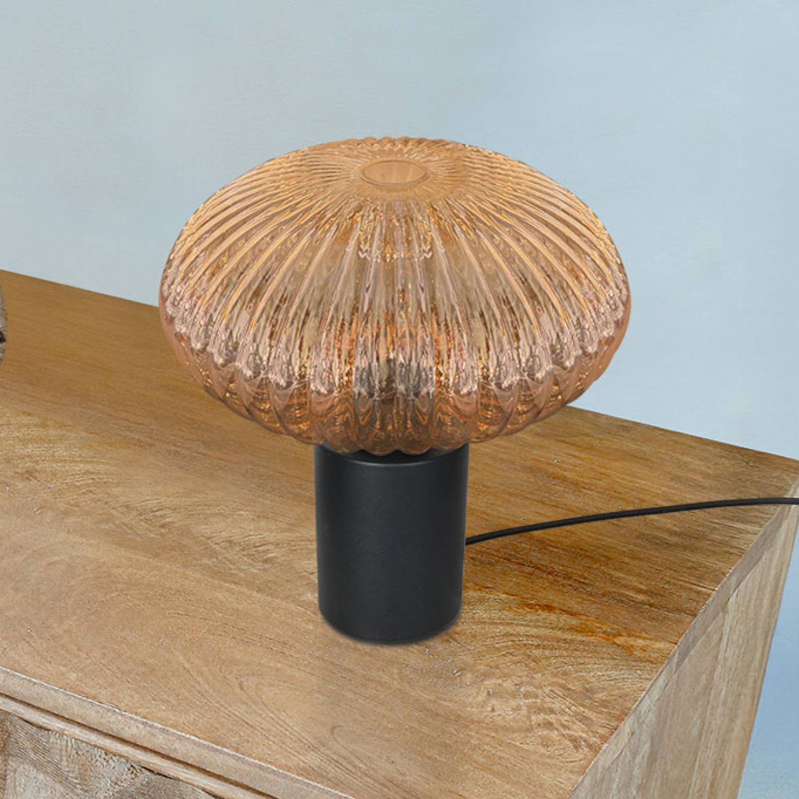 Levně Mexlite Stolní lampa Bloeba, Ø 30 cm černá/jantarová, sklo