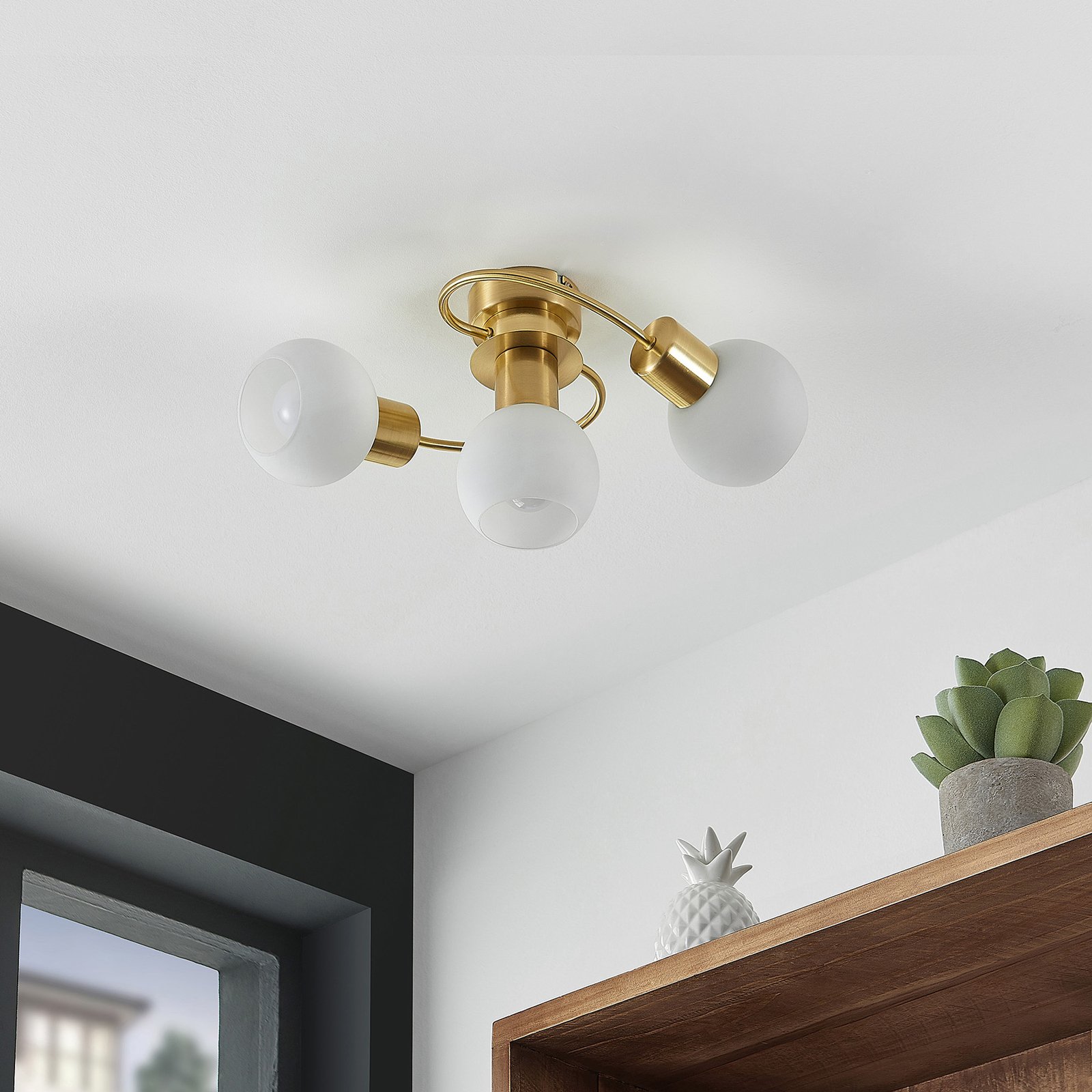 Lindby Ciala ceiling light, 3-bulb, brass-coloured, glass