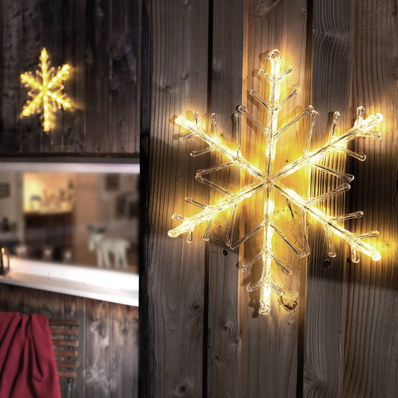 Läs mer om Lysande LED snöflinga, varmvit 40 cm