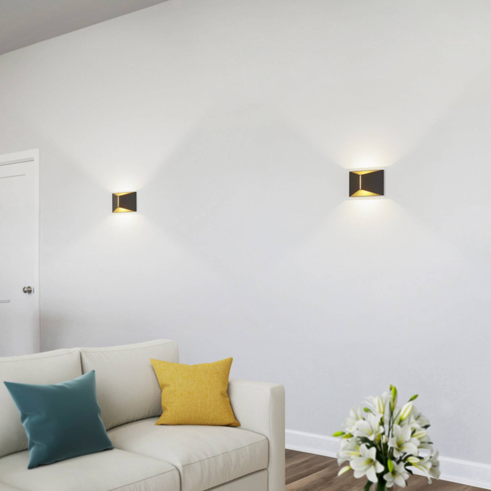 Helestra LED-Wandlampe VID, schwarz/gold, up/down, IP65 günstig online kaufen