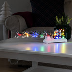 Tafeldeco sneeuwpop met hondenslee bonte LEDs