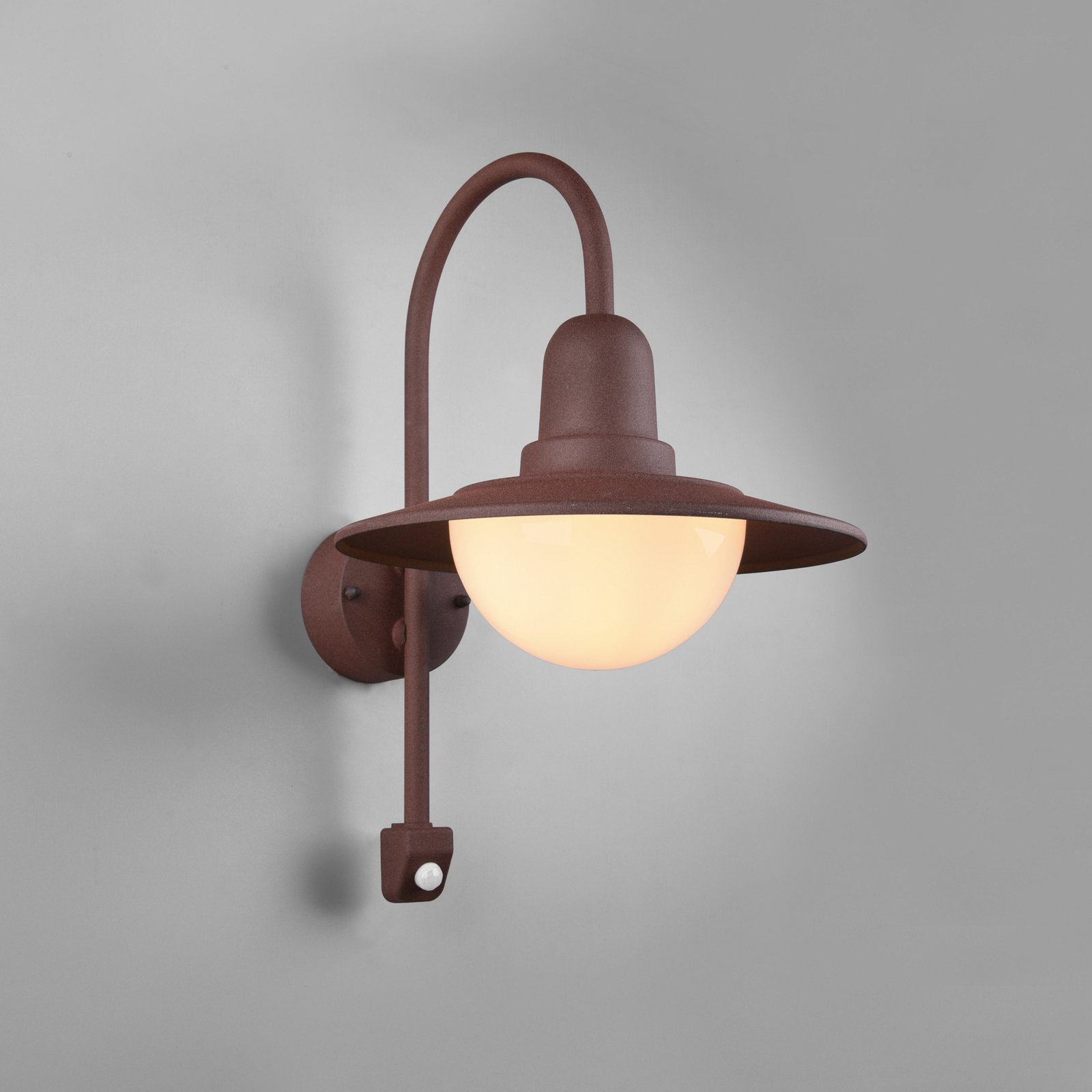 Sensor-buitenwandlamp NORMAN, roest, Ø 30 cm metaal/glas IP44 Sensor-buitenwandlamp NORMAN, roest, Ø 30 cm metaal/glas IP44