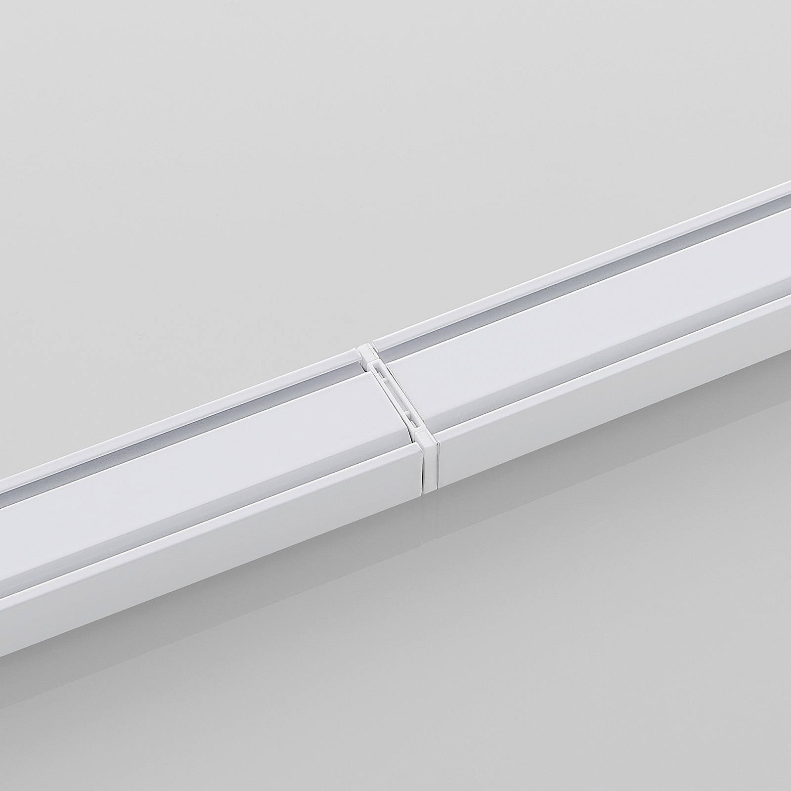 Conector central para sistema de riel, blanco