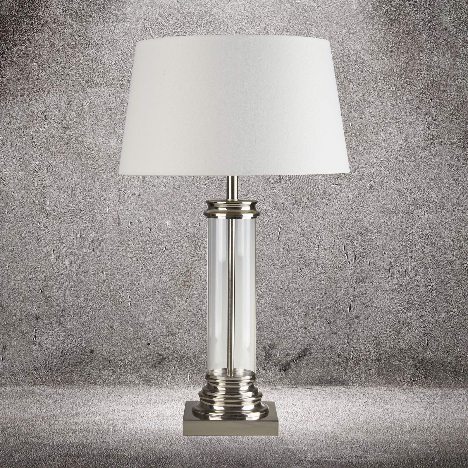 Pedestal table lamp, silver with a cream lampshade