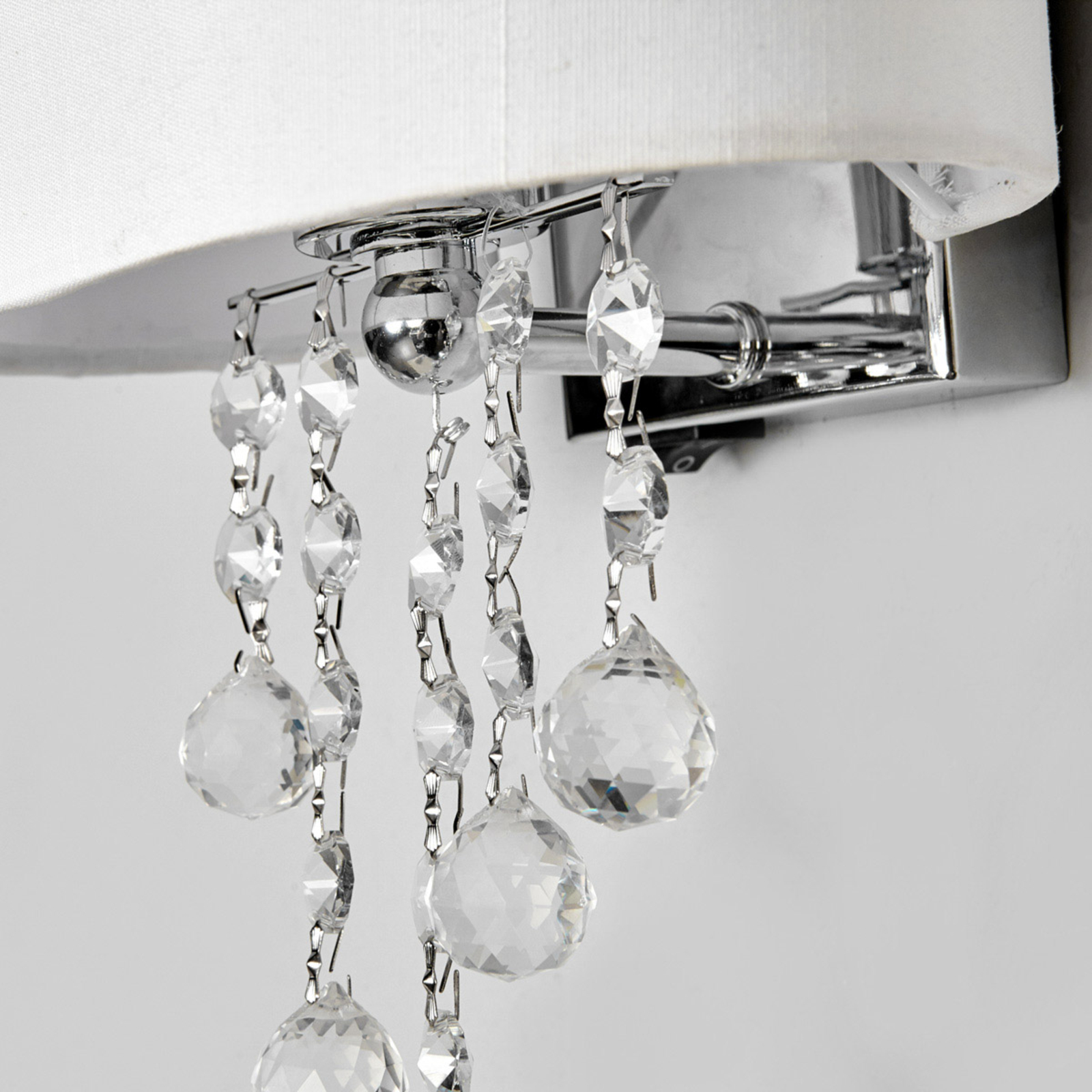 Nina wall light with a fabric lampshade Lights.co.uk