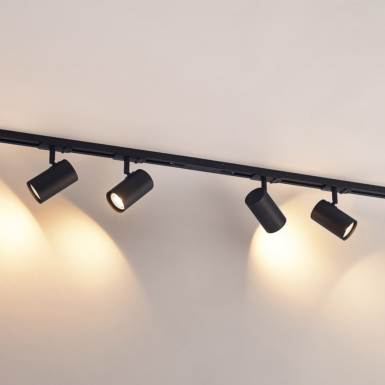 Lindby track lighting system Linaro, GU10, 4-bulb, black, Ø 6 cm