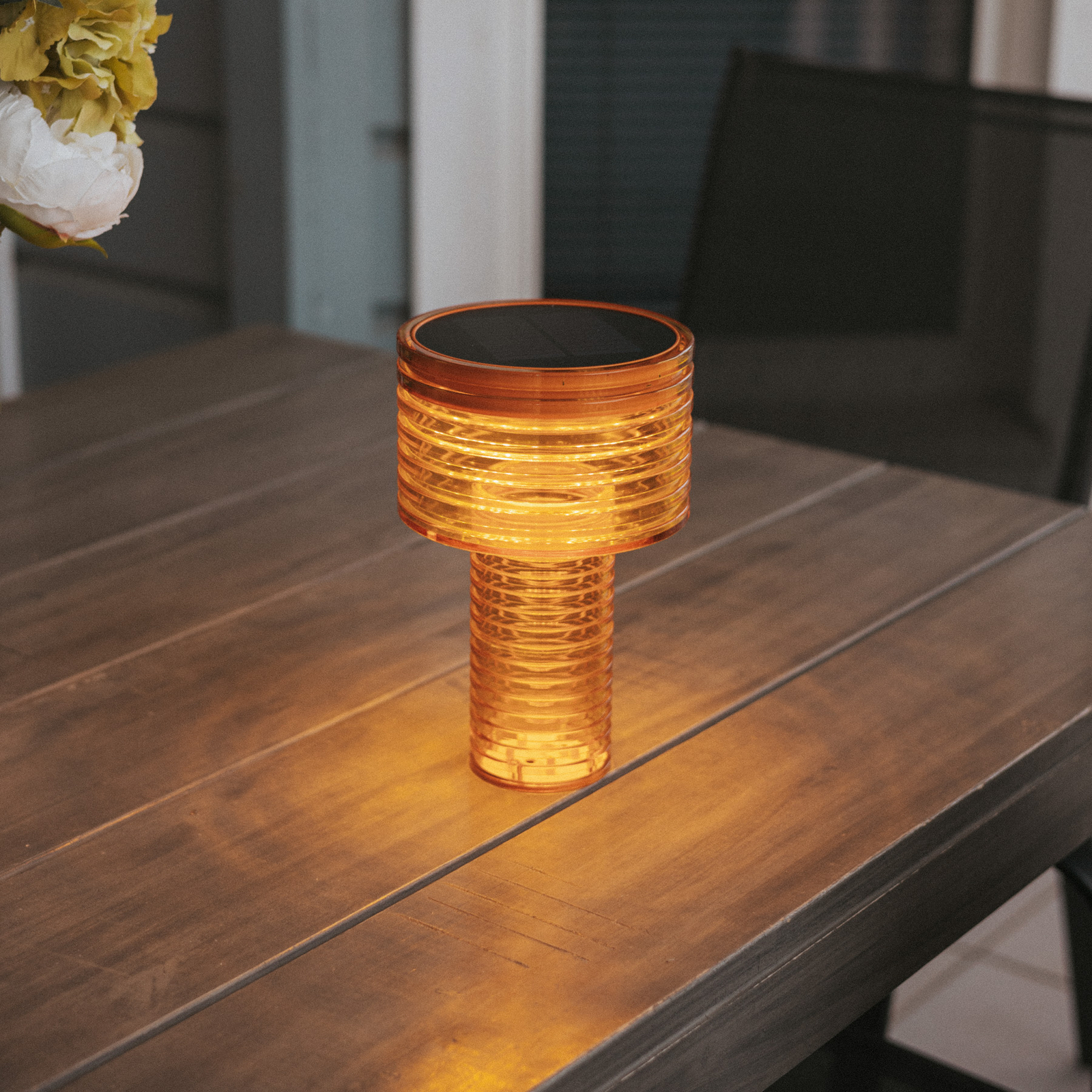 Newgarden LED solar table lamp Ambar, orange, PMMA, IP44