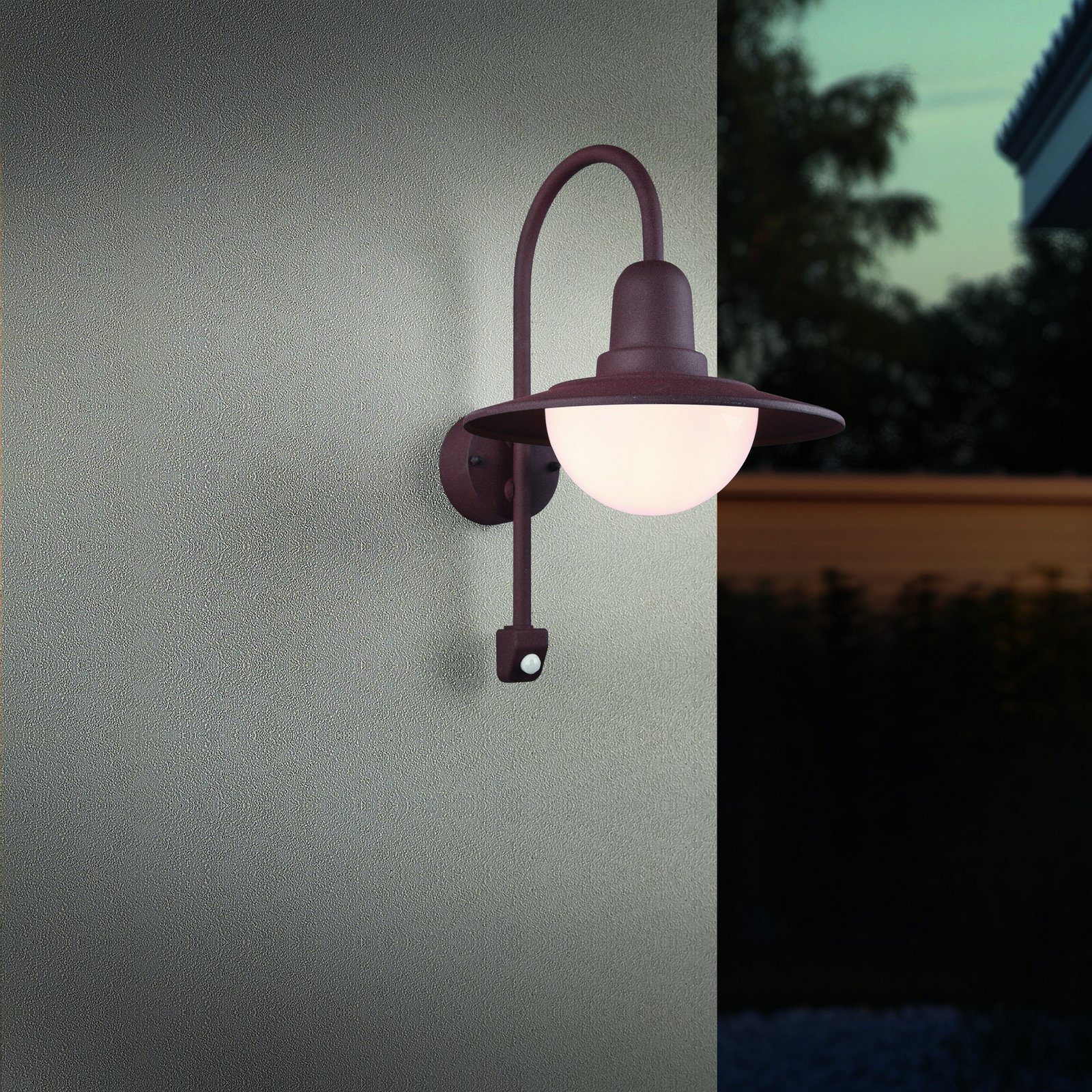 Sensor-buitenwandlamp NORMAN, roest, Ø 30 cm metaal/glas IP44 Sensor-buitenwandlamp NORMAN, roest, Ø 30 cm metaal/glas IP44