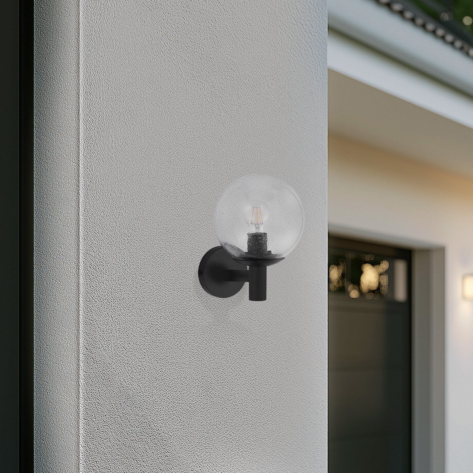 Lindby outdoor wall light Dangan, clear, glass, Ø 20 cm