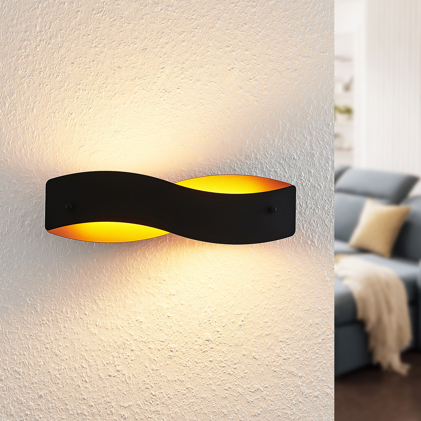 Arcchio Shana LED-vegglampe, svart og gull