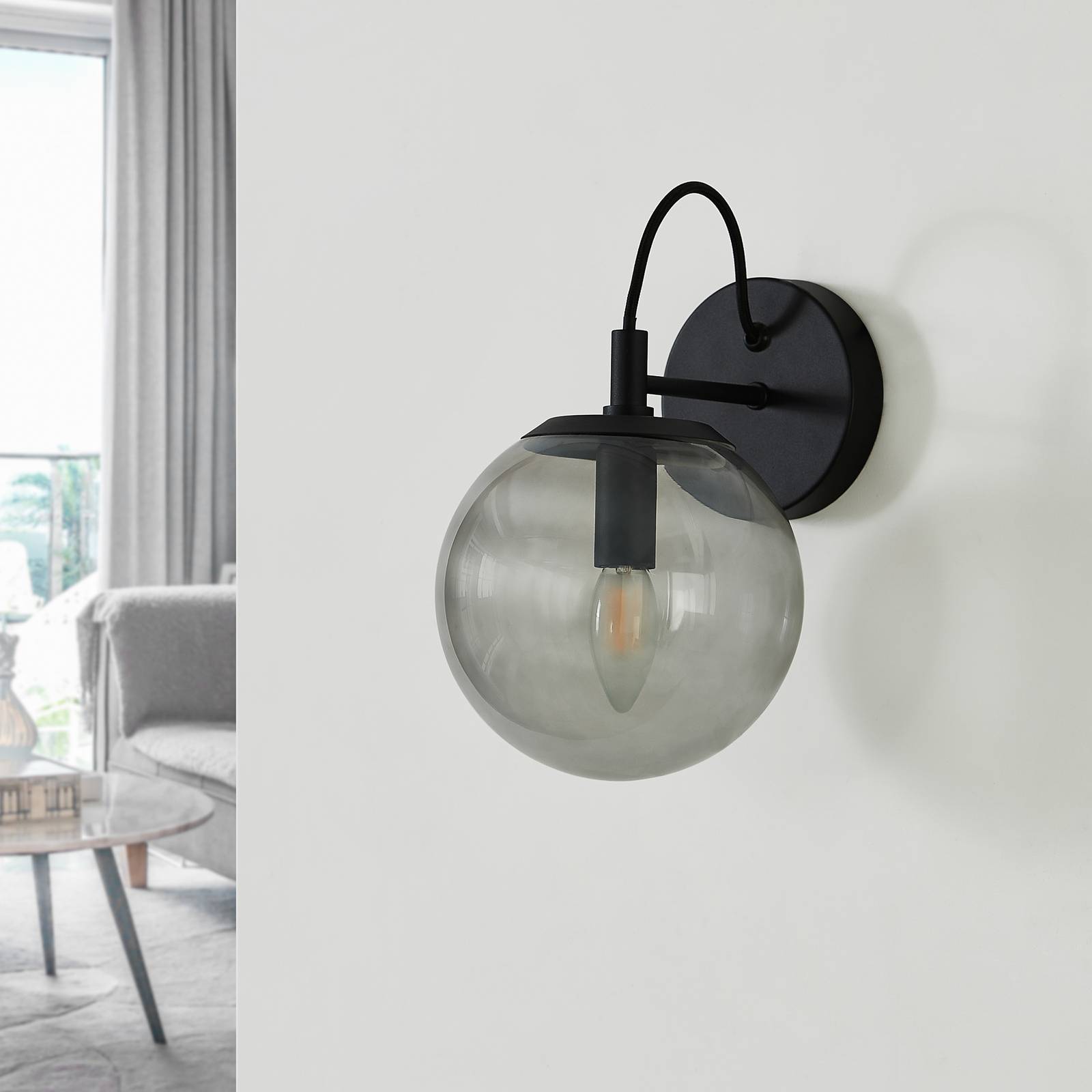 Lucande Sotiana-væglampe, glaskugle, sort